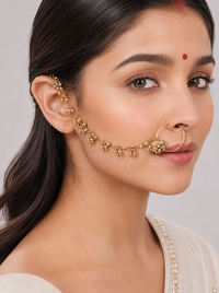 Handcrafted Neerja Antique Floral Nath in antique gold finish featuring a floral nose ring with delicate bead detailing and an ear hook chain for bridal, wedding, and festive ethnic wear.