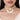 Netra Shell Designer Choker handcrafted with natural cowrie shells, faux pearls, glass bead embroidery, and a Gold Tone Finish, featuring an elegant statement centerpiece with cascading shell drops, perfect for Haldi, Mehndi, weddings, receptions, bridal wear, and festive occasions.