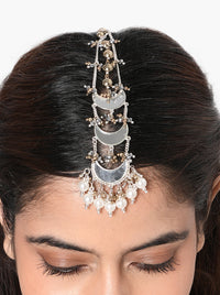 Nitya Mirror Pearl Maangtika handcrafted with layered crescent mirror motifs, faux pearl drops, intricate glass bead detailing, and a Silver Tone Finish, perfect for weddings, Mehndi, Sangeet, festive celebrations, receptions, and contemporary ethnic styling.