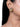 Noa Antique Stud Earrings featuring intricate gold-tone beadwork, crystal accents and a detailed antique finish, styled on a woman.