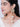 Nyra Bridal Statement Earrings featuring embroidered antique gold motifs, sparkling glass stones, faux pearls, cascading handcrafted jhumki drops, and premium designer bridal styling.
