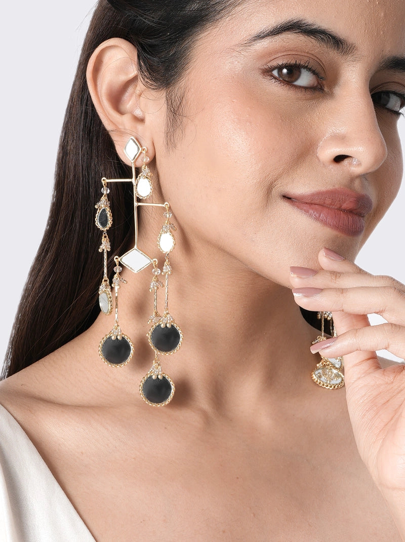 Nyra Mirror Tassel Earrings handcrafted with mirror work, geometric brass detailing and elegant tassel drops in a Gold Tone Finish, perfect for weddings, festive celebrations, cocktail parties, receptions and Indo-western styling.
