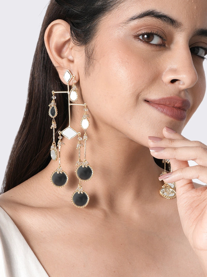 Nyra Mirror Tassel Earrings handcrafted with mirror work, geometric brass detailing and elegant tassel drops in a Gold Tone Finish, perfect for weddings, festive celebrations, cocktail parties, receptions and Indo-western styling.