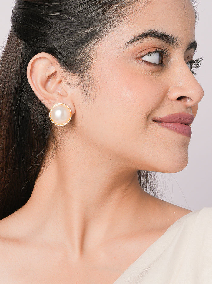 Panda Pearl Stud Earrings handcrafted with luminous faux pearls set in a sleek Gold Tone Finish, perfect for everyday wear, office styling, festive occasions and elegant minimal looks.