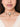 Handcrafted Pihu Mirror Drop Choker featuring an antique gold finish with a mirror centerpiece, crystal drops, bead detailing, and elegant festive craftsmanship.