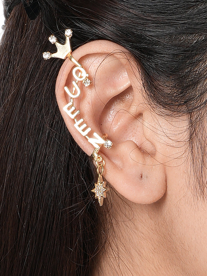 Queen Moodcuff pair handcrafted in brass metal with QUEEN lettering, sparkling crown motif, glass stone accents, star charm, and a Gold Tone Finish, perfect for bridal showers, parties, festive occasions, destination weddings, and contemporary statement styling.