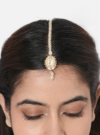 Rashmi Shell Festive Maangtika handcrafted with a natural cowrie shell centerpiece, faux pearls, glass bead embroidery, and a Gold Tone Finish, perfect for Haldi, Mehndi, intimate weddings, festive celebrations, poojas, and elegant bridal styling.