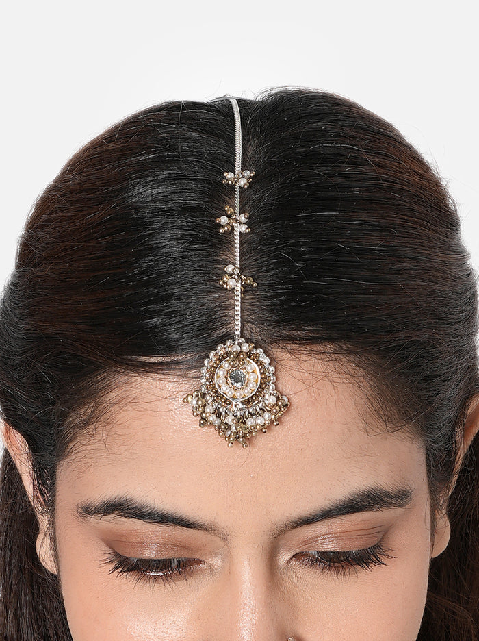 Rashmika Antique Fashion Maangtika handcrafted with a mirror centerpiece, faux pearls, intricate glass bead detailing, and an Antique Tone Finish, perfect for weddings, receptions, Mehndi, Sangeet, festive celebrations, and elegant bridal styling.