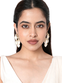 Reeva Handmade Cowrie Earrings handcrafted with natural cowrie shells, faux pearls, intricate glass bead embroidery, and a Gold Tone Finish, creating elegant statement earrings perfect for Haldi, Mehndi, weddings, receptions, destination weddings, festive celebrations, and ethnic styling.