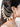 Riniya Cowrie Ear Chain featuring handcrafted shell accents, layered pearl chains, gold tone detailing, and statement ear drape styling for bridal jewelry, festive occasions, destination weddings, and contemporary ethnic fashion.