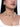 Ruhani Statement Seashell Choker featuring natural ivory seashell drops, faux pearls, intricate glass beadwork and gold-tone detailing, styled on a woman.