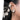 Rupali Shell Earchain Earrings featuring intricate pearl clusters, white seashell details, gold-tone beads and a decorative ear chain, styled on a woman.