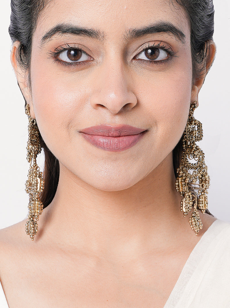 Handcrafted Shanaya Luxe Artisan Earrings featuring brass metal, thread embroidery and bead detailing with an elegant Antique Finish for bridal and festive wear.