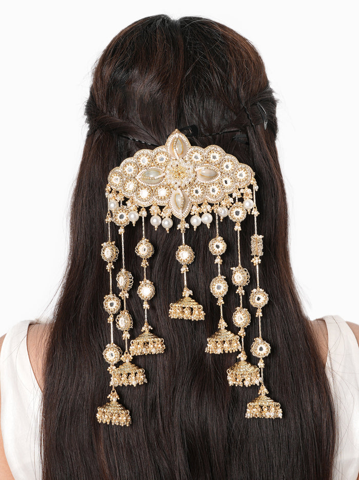 Shreya Mirror Hair Accessory handcrafted with mirror detailing, shell accents, faux pearls, glass bead embroidery, cascading jhumka charms, and a Gold Tone Finish, perfect for bridal entries, Haldi, Mehndi, Sangeet, weddings, receptions, and luxurious bridal hairstyles.