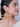 Siara Pearl Statement Earrings featuring handcrafted floral motifs, peach and ivory faux pearl drops, intricate bead embroidery, and elegant gold tone finish for festive and bridal wear.