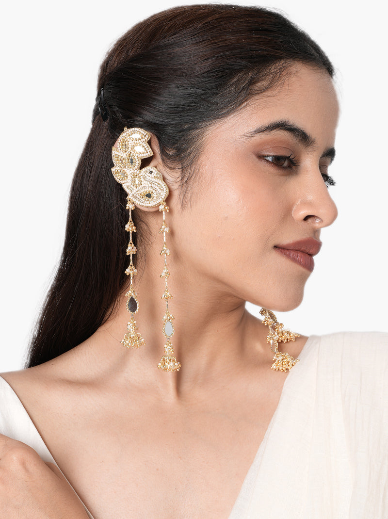 Siddhi Embroidered Tassel Earrings handcrafted with intricate thread embroidery, mirror accents, glass bead detailing, long tassel drops, matching embroidered earcuff, and a Gold Tone Finish, perfect for Haldi, Mehndi, weddings, festive celebrations, receptions, and elegant bridal styling.