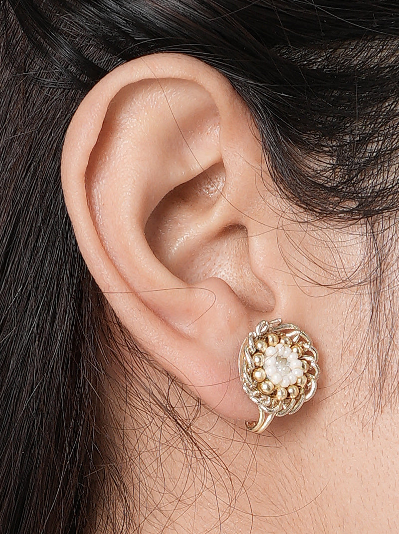 Sitara Simple Mirror Earcuff handcrafted with a floral mirror centerpiece, delicate glass bead detailing, brass metal, and a Gold Tone Finish, perfect for festive celebrations, office wear, casual outings, intimate weddings, and elegant everyday styling.