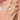 Saboya Bridal Beaded Ring featuring embroidered shell accents, faux pearls, glass stone centerpiece and gold tone finish for bridal and festive wear.