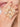 Saboya Bridal Beaded Ring featuring embroidered shell accents, faux pearls, glass stone centerpiece and gold tone finish for bridal and festive wear.