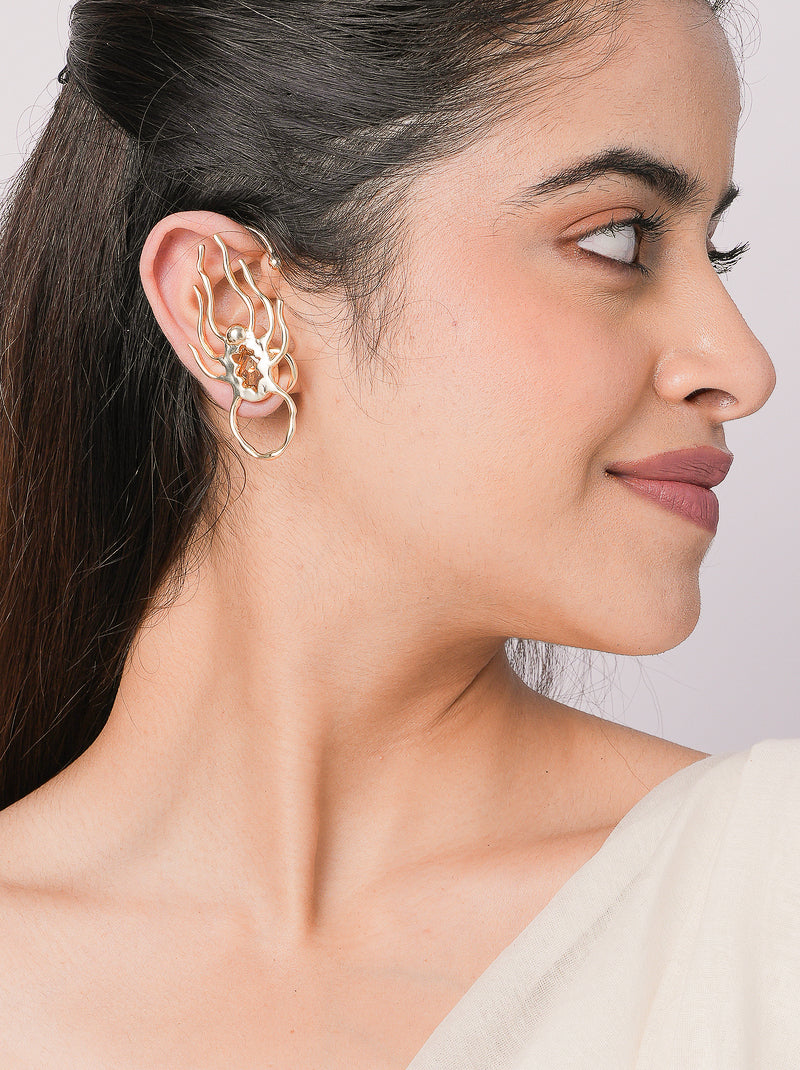 Spider Contemporary Designer Earcuff handcrafted in brass with an abstract sculptural design and gold tone finish.