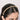 Handcrafted Svara Crystal Bloom Hairband featuring brass metal, floral glass stone detailing and pearl accents with an elegant Antique Finish for bridal and festive hairstyles.
