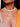 Ujjvala Beaded Designer Choker handcrafted with vibrant pink and orange bead embroidery, hanging bead charms, and a gold tone finish for festive and bridal wear.