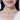 Trisha Floral Pearl Choker handcrafted with sculpted floral motifs, intricate pearl embroidery, layered bead detailing and a luxurious gold tone finish for bridal and festive occasions.