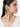Unnati Fashion Shell Earrings handcrafted with natural shell petals, faux pearls, mirror accents, cascading glass bead chains, and a Gold Tone Finish, perfect for Haldi, Mehndi, destination weddings, beach weddings, festive celebrations, cocktail parties, and luxury ethnic styling.
