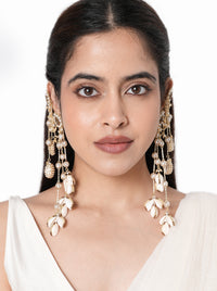 Unnati Fashion Shell Earrings handcrafted with natural shell petals, faux pearls, mirror accents, cascading glass bead chains, and a Gold Tone Finish, perfect for Haldi, Mehndi, destination weddings, beach weddings, festive celebrations, cocktail parties, and luxury ethnic styling.