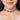 Handcrafted Tia Antique Crystal Choker featuring antique coin-inspired motifs, crystal embellishments, intricate beadwork, and an antique gold finish for bridal and festive wear.