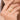 Riti Bow Statement Ring handcrafted in premium brass featuring polished bow-inspired motifs with an elegant gold tone finish and adjustable open band.