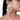 Vashti Traditional Bridal Earrings featuring pearl clusters, shell motifs, intricate gold-tone beadwork and cascading drops, styled on a bride.