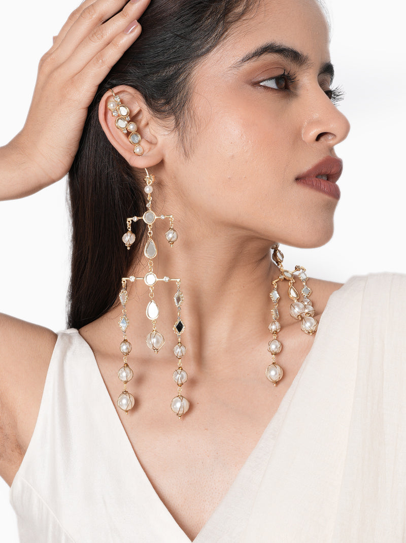 Vertika Mirror Designer Earrings handcrafted with mirror accents, faux pearls, cascading glass bead detailing, and a Gold Tone Finish, perfect for weddings, receptions, Haldi, Mehndi, Sangeet, festive occasions, destination weddings, and luxury bridal styling.