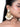 Vritika Handmade Seashell Earrings featuring intricate gold-tone beadwork, pearl detailing and cascading seashell motifs, styled on a woman.
