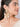 Wariya Cowrie Shell Earrings featuring handcrafted cowrie shell motifs, pearl embellishments, intricate bead detailing, and gold tone finish, designed for bridal jewelry, haldi celebrations, mehendi functions, destination weddings, festive occasions, and contemporary ethnic fashion styling.