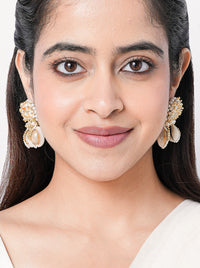 Yug Embroidered Shell Earrings featuring embroidered beadwork, cowrie shell drops, faux pearls and a gold tone finish for bridal and festive wear.