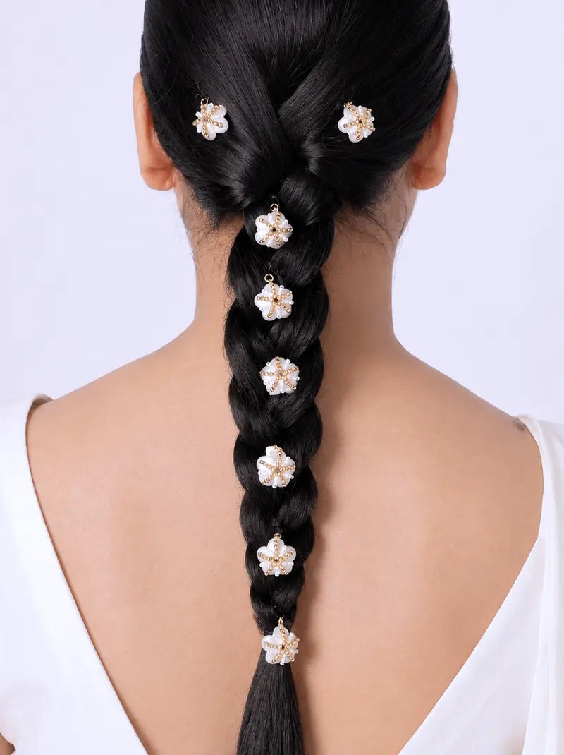 Ziya Floral Hair Clips featuring handcrafted white pearl flower motifs with a gold tone finish, perfect for bridal braids, buns, ponytails, wedding hairstyles, festive occasions, and elegant hair styling.