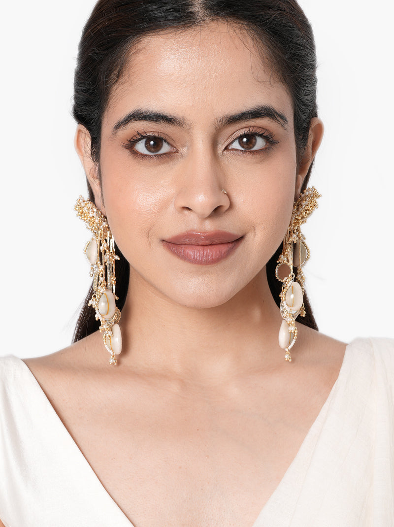 Zoya Mirror Shell Earchain handcrafted with natural shells, mirror accents, cascading brass chains, glass bead detailing, and a Gold Tone Finish, perfect for brides, Haldi, Mehndi, Sangeet, destination weddings, receptions, and luxury bridal styling.