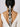 Aanya Floral Pearl Braid handcrafted with white resin flowers, pearls, intricate beadwork and cascading pearl tassels, designed for elegant bridal braid hairstyles.