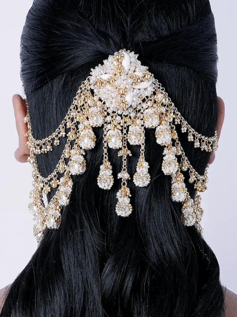 Alka Pearl Chain Hair Accessory featuring handcrafted pearl clusters, cascading gold chains, floral detailing and a gold tone finish with ear chain accents, perfect for bridal hairstyles, weddings and festive celebrations.