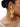 Anbu Statement Ear Cuff featuring mustard thread detailing, faux pearls, glass stone accents, gold-tone finish and cascading pearl tassels for an elegant ethnic look.