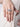 Close-up of Aria Crystal Statement Ring featuring baguette-cut crystal stones in a Silver Tone Finish on an adjustable handcrafted band.