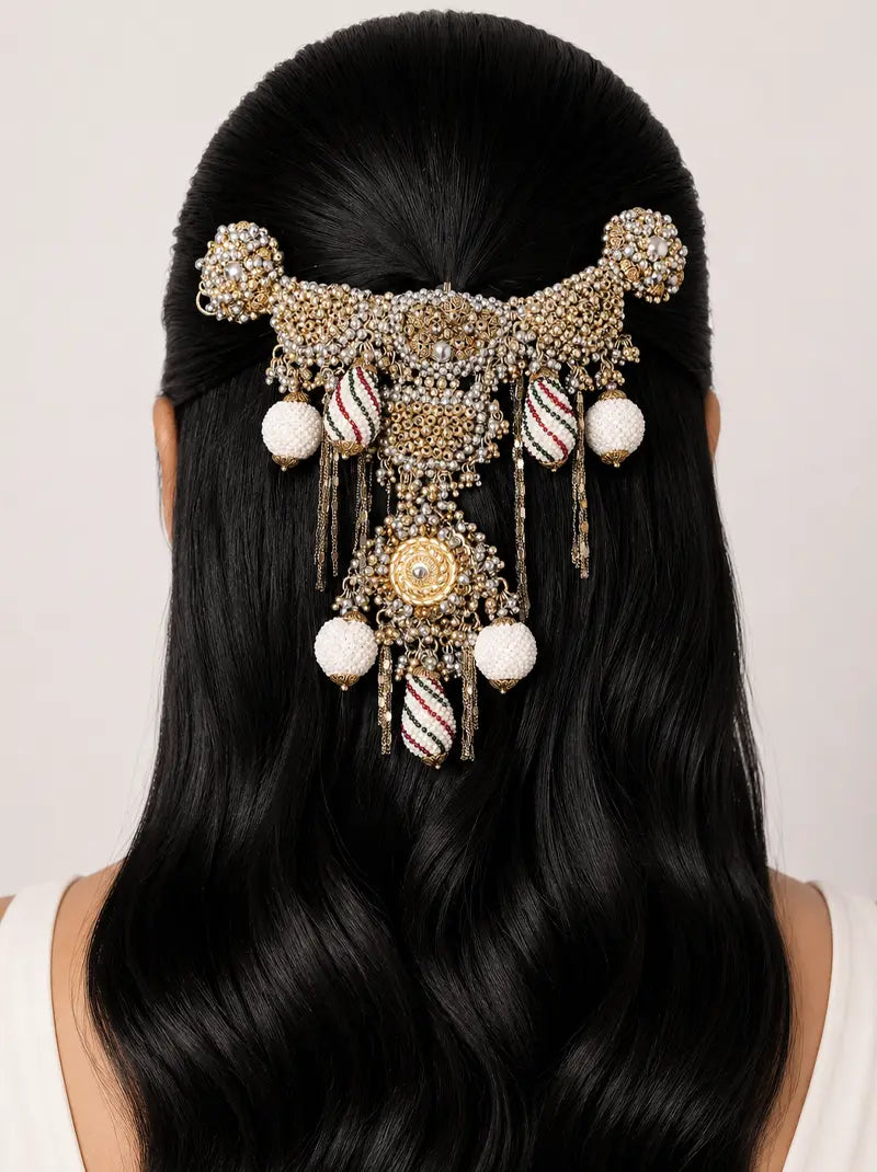 Arohi Bridal Hair Accessory featuring handcrafted antique dual-tone beadwork, floral motifs, tassel detailing and ivory accents for bridal and festive hairstyles.