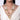 Dharan Pearl Tassel Necklace handcrafted with layered faux pearl strands, ornate beadwork, embellished pendant and pearl tassels in a gold tone finish for bridal and festive wear.