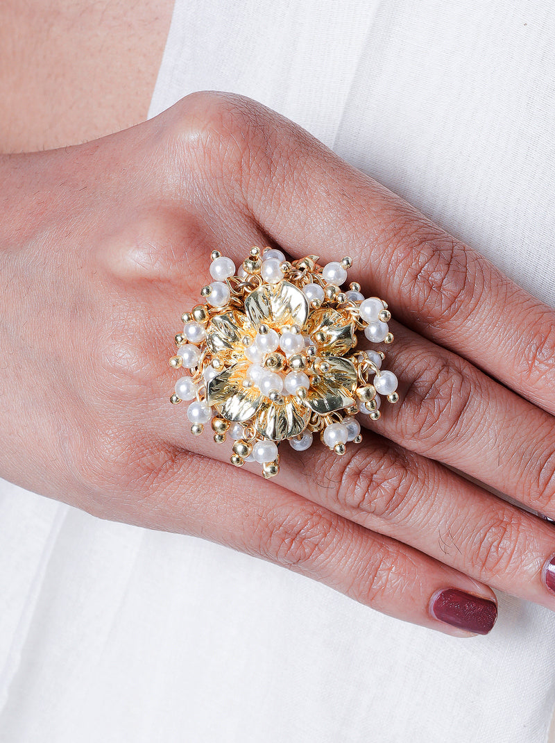 Mehtaab Pearl Floral Ring handcrafted with sculpted gold floral petals, faux pearl clusters and luxurious 22kt gold plating, designed as a statement ring for bridal and festive occasions.