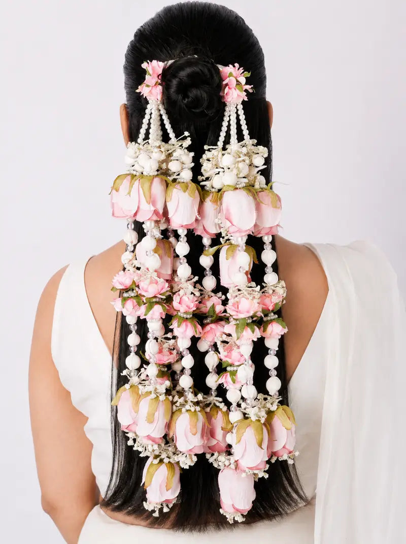 Kusum Floral Hair Accessory featuring handcrafted blush pink flowers, cascading pearl strands, delicate floral clusters and intricate detailing, perfect for bridal hairstyles, weddings and festive celebrations.