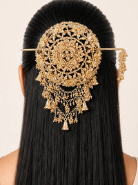 Mani Royal Bridal Hair Bun Stick featuring an intricate gold-tone circular filigree design with cascading chain tassels and bell charms for bridal and festive hairstyles.