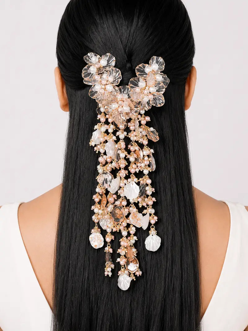 Maya Floral Pearl Hair Accessory featuring handcrafted translucent floral petals, pearls, cascading beadwork and a rose gold tone finish, ideal for bridal hairstyles, weddings, receptions and festive celebrations.