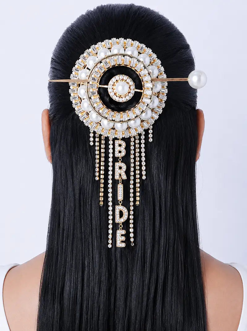 Raha Personalized Bridal Hairbun featuring pearl and crystal embellishments with customizable letter charms and cascading crystal strands, perfect for bridal buns, weddings and reception hairstyles.