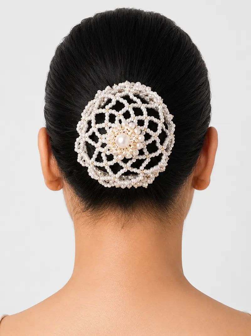 Saya Pearl Bun Net handcrafted with an intricate faux pearl lattice design and floral centerpiece, creating an elegant bridal hair accessory for wedding buns.